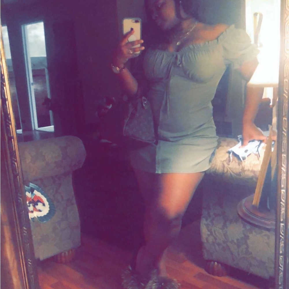 Khaki/ olive green fit and flare dress.